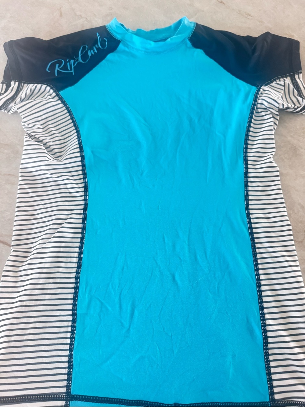 Rip Curl UPF 50+ Rash Guard Swim Shirt Womens Blue Black Striped Short Sleeve